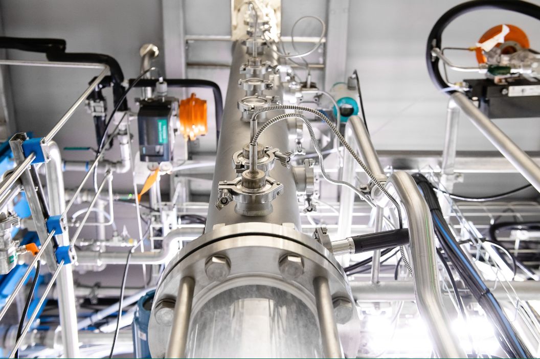 兔子腸道菌能發電？紐西蘭新創 LanzaTech 用細菌把廢氣「釀」成能源，航空集團、Lululemon 台灣供應商都成客戶